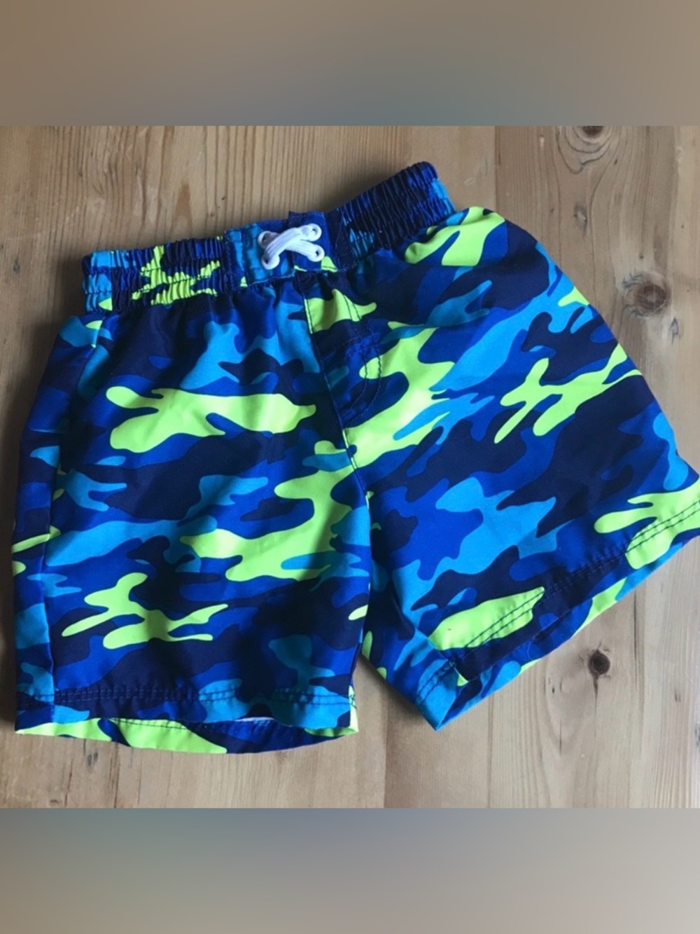 OP 6-9 mos blue & yellow watery camo swim trunks
